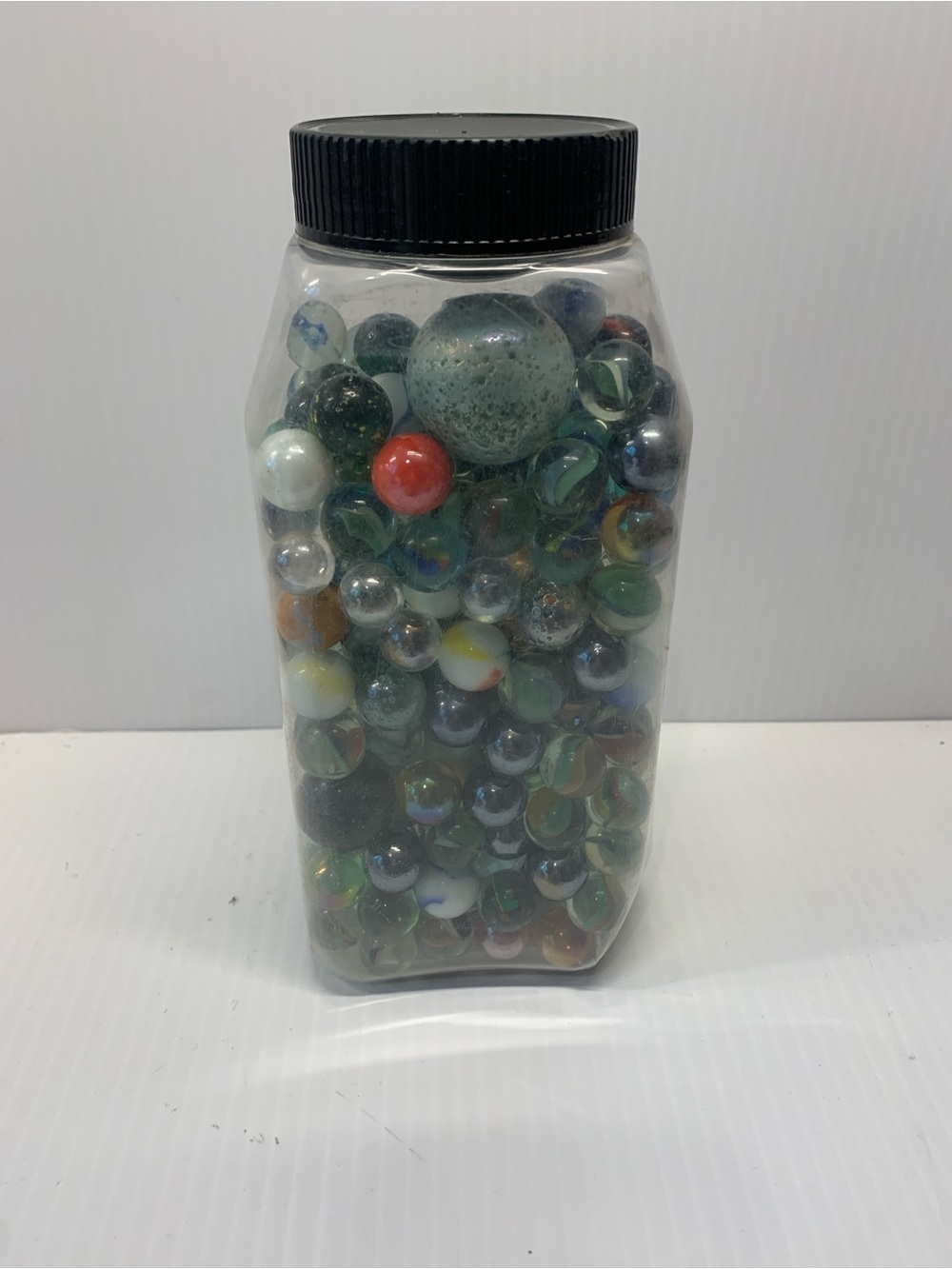 Assorted Glass Marbles in Clear Plastic Jar - Multicolor